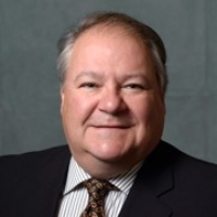 Dr. Neil E Torgerson