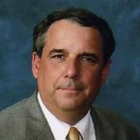 Dr. Clark M Carroll