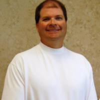 Dr. John R Lindeman