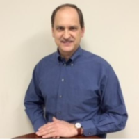 Dr. Myron D Schrock