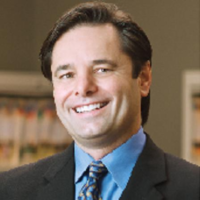 Dr. Dennis J Perrott