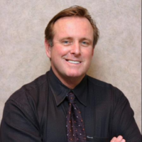 Dr. James  Schumacher
