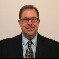 Dr. John J Mrozek