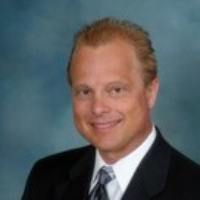 Dr. David E Domaas