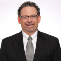 Dr. Jerry E Udelson