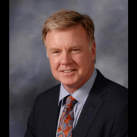 Dr. Greggory E Tharp