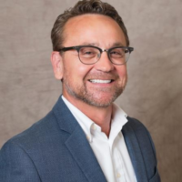 Dr. Stephen K Russell