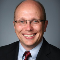 Dr. James G Koller