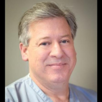 Dr. Daniel E Riggs