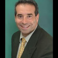 Dr. Lee T Frost