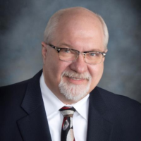 Dr. Charles S Skoglund