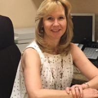Dr. Susan M Mischissin