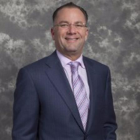 Dr. BRIAN S KROST