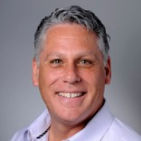 Dr. Bruce J Roland