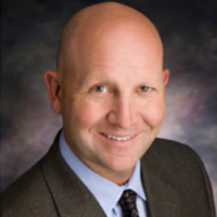 Dr. CHRISTOPHER ANTHONY BUTTNER