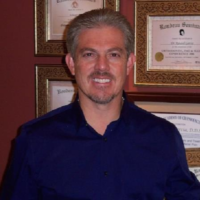 Dr. RANDALL E GARCIA