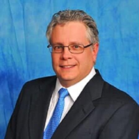 Dr. Thomas R Hada