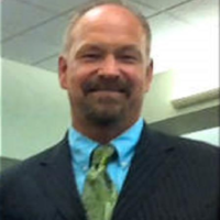 Dr. Mark K Burgess