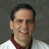 Dr. Marc J Beshar