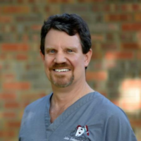 Dr. John E Halversen