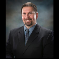 Dr. James R Macholl