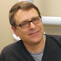 Dr. John P James