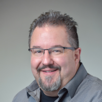 Dr. John G Kostides