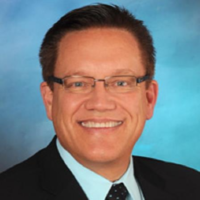 Dr. Michael J Uzelac