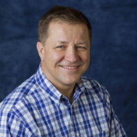 Dr. Gregory J Maharry