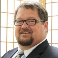 Dr. Robert D Herron