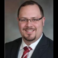 Dr. Andrew  Bachman
