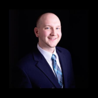 Dr. Travis R. Baskerville