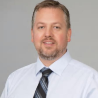 Dr. Corey W Woods
