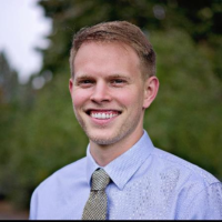 Dr. Austin M May
