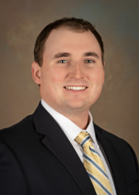 Dr. Adam K. Stachler