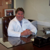 Dr. Christopher  Reilly