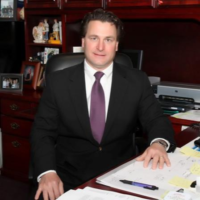 Dr. BRIAN Tory HEINE