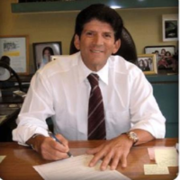 Dr. Norman E Rich