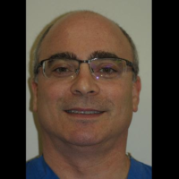 Dr. Aaron  Milchman