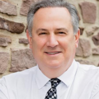 Dr. Edward  Magida