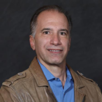 Dr. James  Karamitsios