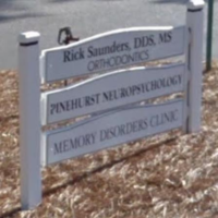 Dr. Carl E Saunders