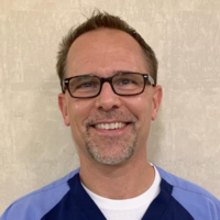 Dr. Brian E Garrison