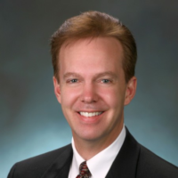Dr. Roger M Amundson