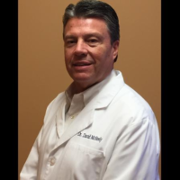 Dr. David E McNeely