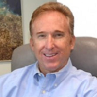 Dr. Peter E McGowan