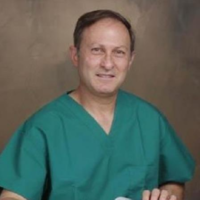 Dr. John James Radomile