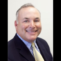 Dr. John C Black