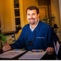 Dr. Andrew  Lunn