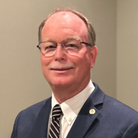 Dr. Michael W King